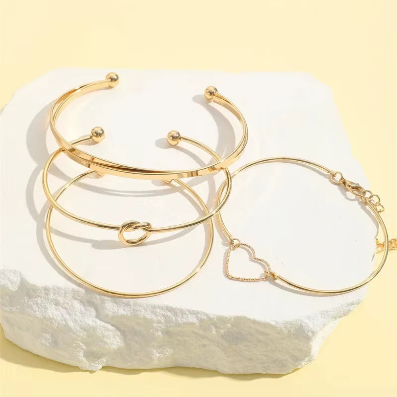 4pc Gold Twist Bracelet Set